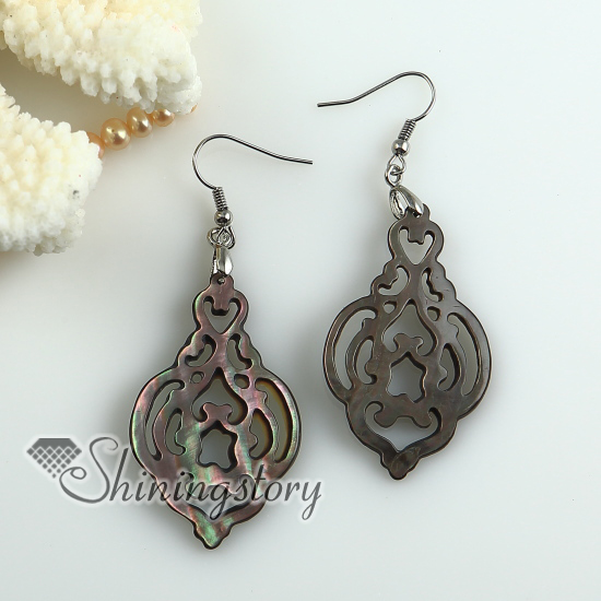 openwork penguin oyster sea shell mother of pearl earrings